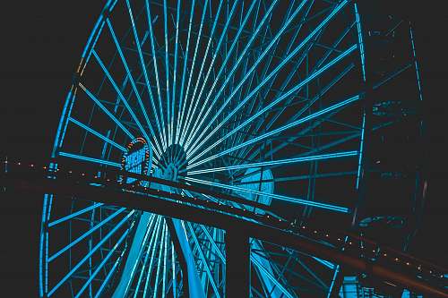 amusement park blue Ferris wheel at night the santa monica pier